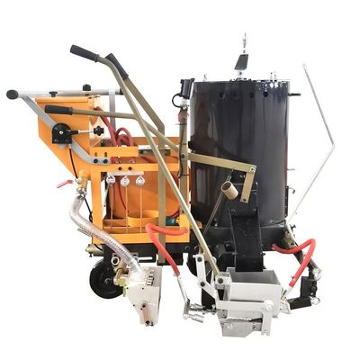 Machine de décapage de lignes de route thermoplastiques à poussée humaine