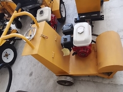 Machine à balayer les marquages routiers